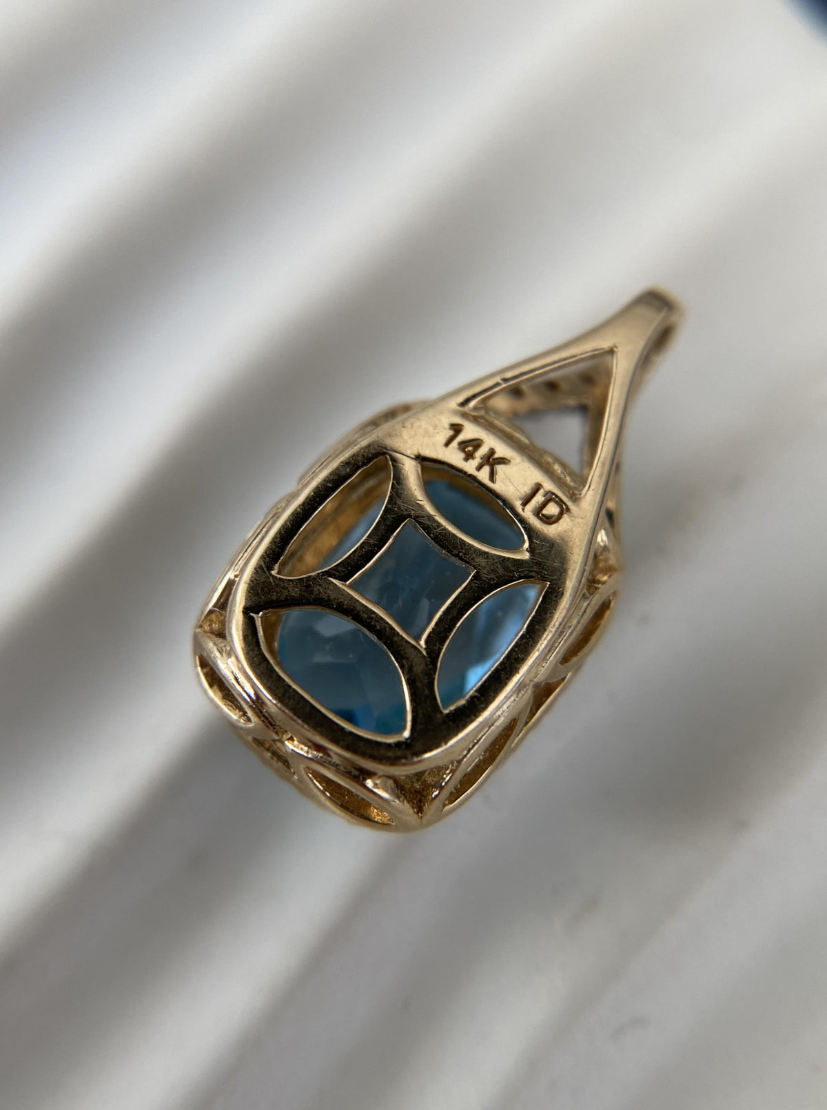 Topaz Pendant With Diamond Halo