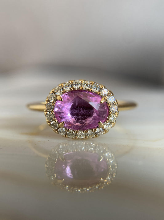 East West Oval Pink Sapphire Ring With Diamond Halo