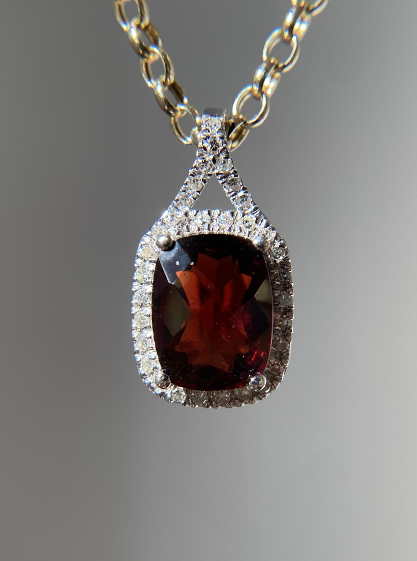 Garnet Pendant With Diamond Halo