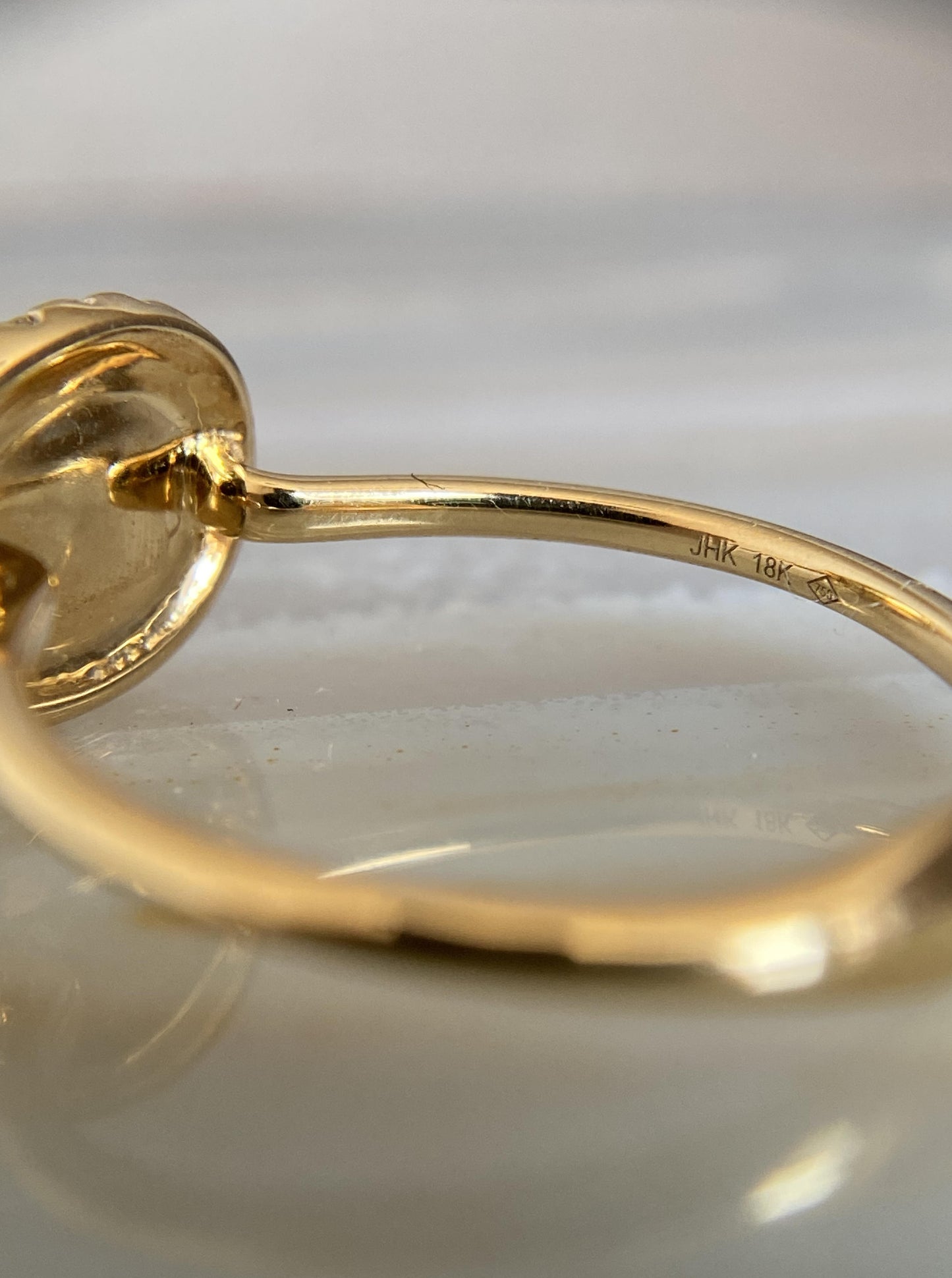 East West Oval Pink Sapphire Ring With Diamond Halo