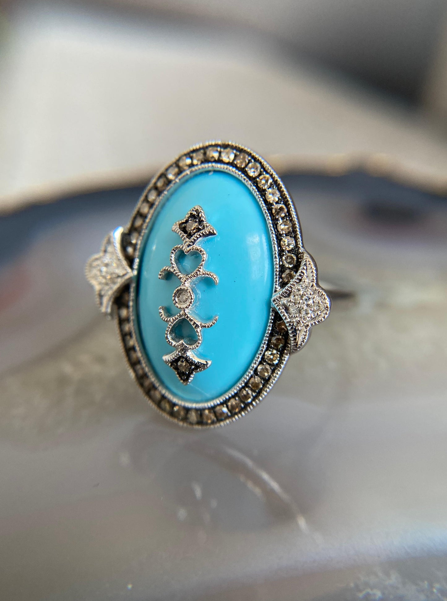 Vintage White Gold Oval Turquoise Ring with Champagne Diamond Halo